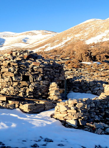 Mitato (a shepherd's shelter) surrounded by snow
